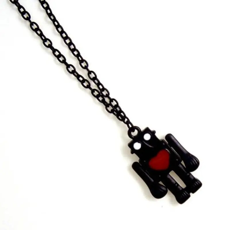 Robot-halsband med svart kedja och rött hjärta