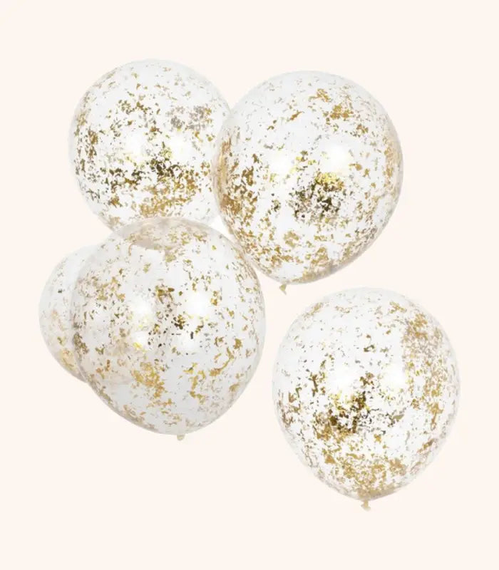 Konfettiballonger med guld konfetti inuti. Blås enkelt upp ballongerna och låt festen börja!